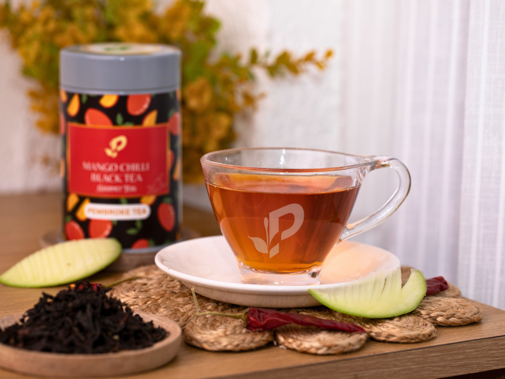 Mango Chilli Black Tea brewed showing exotic color and steam